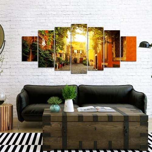 Living room with multi-panel wall art and dark sofa