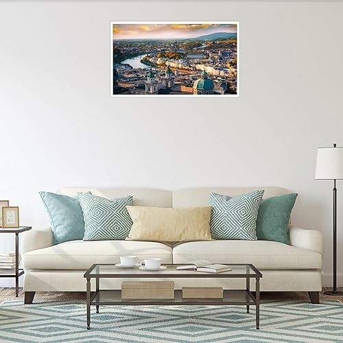 Living room with a sofa and cityscape wall art.