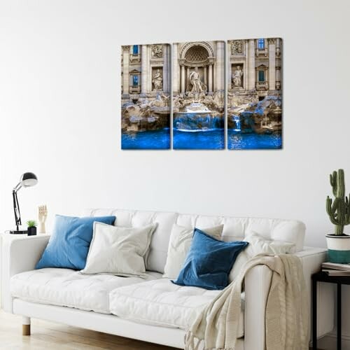 Living room with white sofa and wall art