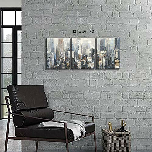 Contemporary living room with black chair and cityscape wall art