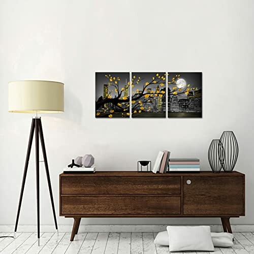 Modern living room with a floor lamp, wooden console, and triptych wall art.