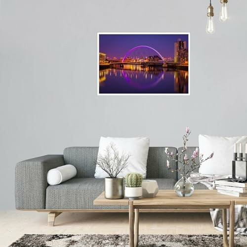 Living room with gray sofa, coffee table, and cityscape artwork on the wall.