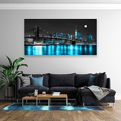 Modern living room with cityscape art on wall.