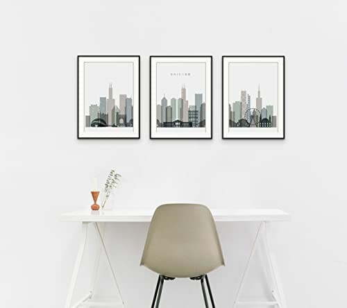 Minimalist office with cityscape artwork on the wall.