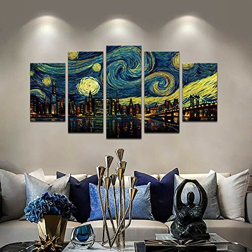 Five-panel wall art depicting a starry night cityscape above a modern living room with decorative elements.